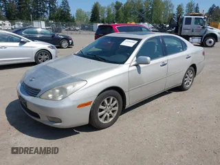 2002 Lexus ES 300 with VIN JTHBF30G320044114, listed as a IAAI auction lot 42104340 with 306,739 mi miles. Bid and sale history available at carsss.com. Image 2.
