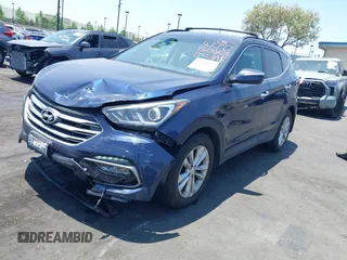 2018 Hyundai Santa Fe 2.0T z VIN 5XYZU4LA8JG537427, wystawiony jako IAAI lot #42349692 z przebiegiem 148 764 mil mil oraz . Historia ofert i sprzedaży dostępna na DreamBid. Obrazek 17.