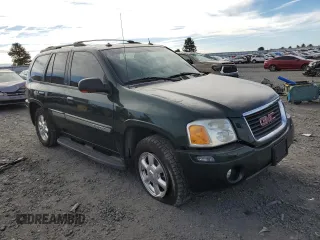 2004 GMC Envoy SLT with VIN 1GKDT13S642185410, listed as a Copart auction lot 72572504 with 136,193 mi miles and Salvage Title. Bid and sale history available at DreamBid. Image 4.