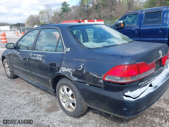 2002 Honda Accord Sdn SE with VIN 1HGCG66852A019330, listed as a IAAI auction lot 41984581 with 229,533 mi miles. Bid and sale history available at carsss.com. Image 3.