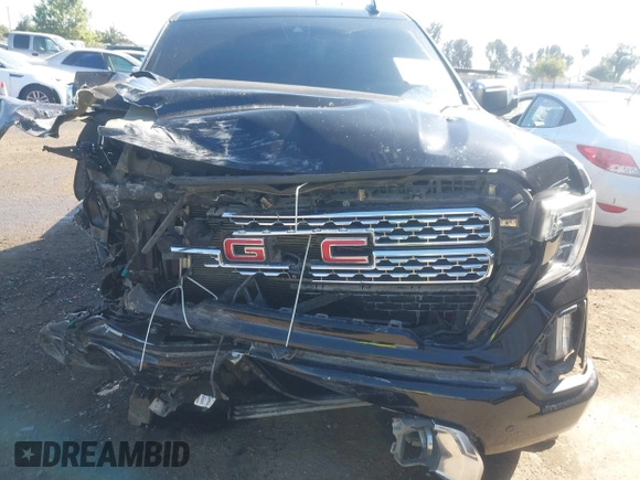 2019 GMC Sierra 1500 Denali z VIN 1GTU9FEL8KZ173809, wystawiony jako IAAI lot #42363300 z przebiegiem 75 425 mil mil oraz . Historia ofert i sprzedaży dostępna na DreamBid. Obrazek 6.