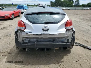 2013 Hyundai Veloster w/Gray Int z VIN KMHTC6AD3DU135296, wystawiony jako Copart lot #59778985 z przebiegiem 125 134 mil mil oraz Czysty tytuł • Clean title. Historia ofert i sprzedaży dostępna na DreamBid. Obrazek 6.