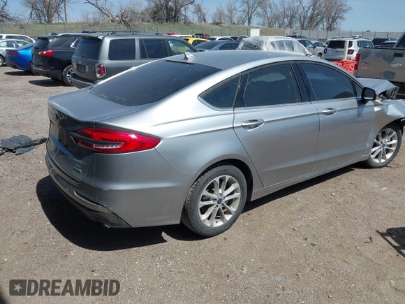 2020 Ford Fusion SE z VIN 3FA6P0HD9LR231471, wystawiony jako IAAI lot #41986473 z przebiegiem 58 587 mil mil oraz . Historia ofert i sprzedaży dostępna na DreamBid. Obrazek 4.