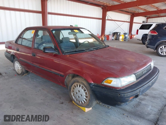 1990 Toyota Corolla z VIN 1NXAE94A1LZ117401, wystawiony jako IAAI lot #41755431 z przebiegiem 81 786 mil mil oraz . Historia ofert i sprzedaży dostępna na DreamBid. Obrazek 1.