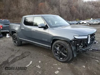 2023 Rivian R1T Adventure z VIN 7FCTGBAA8PN028065, wystawiony jako Copart lot #81941474 z przebiegiem 16 060 mil mil oraz Szkoda całkowita • Salvage title. Historia ofert i sprzedaży dostępna na DreamBid. Obrazek 4.