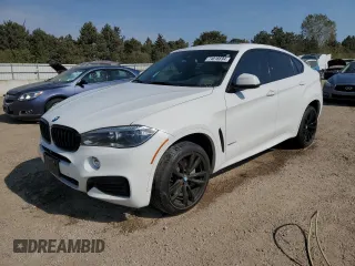 2018 BMW X6 xDrive50i with VIN 5UXKU6C56J0Z66652, listed as a Copart auction lot 74816694 with 56,229 mi miles and Salvage Title. Bid and sale history available at carsss.com. Image 1.