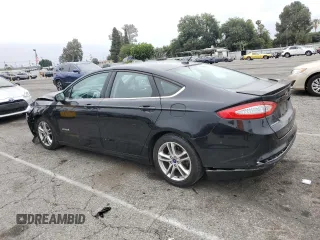 2016 Ford Fusion SE Hybrid with VIN 3FA6P0LU9GR203845, listed as a Copart auction lot 62026805 with 102,456 mi miles and Salvage title. Bid and sale history available at DreamBid. Image 2.