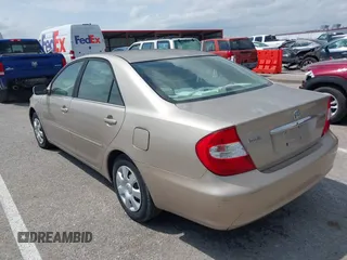 2003 Toyota Camry LE with VIN 4T1BE32K13U243738, listed as a IAAI auction lot 42120647 with Not Provided miles and . Bid and sale history available at DreamBid. Image 3.
