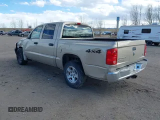 2005 Dodge Dakota SLT with VIN 1D7HW48N45S199371, listed as a IAAI auction lot 41792900 with 170,893 mi miles. Bid and sale history available at carsss.com. Image 3.