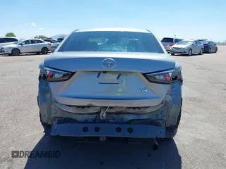 2016 Scion iA z VIN 3MYDLBZV1GY132561, wystawiony jako IAAI lot #42425947 z przebiegiem 94 882 mil mil oraz . Historia ofert i sprzedaży dostępna na DreamBid. Obrazek 17.