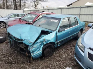 1992 Plymouth Acclaim z VIN 1P3XA4631NF248220, wystawiony jako Copart lot #84113754 z przebiegiem 117 489 mil mil oraz Szkody całkowita. Historia ofert i sprzedaży dostępna na DreamBid. Obrazek 1.