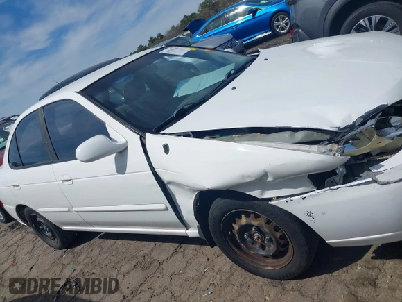 2002 Nissan Sentra GXE z VIN 3N1CB51D12L649594, wystawiony jako IAAI lot #41758242 z przebiegiem 274 883 mil mil oraz . Historia ofert i sprzedaży dostępna na DreamBid. Obrazek 13.