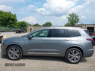 2021 Cadillac XT6 Premium Luxury with VIN 1GYKPDRS9MZ118642, listed as a IAAI auction lot 42664965 with 65,566 mi miles and . Bid and sale history available at DreamBid. Image 14.