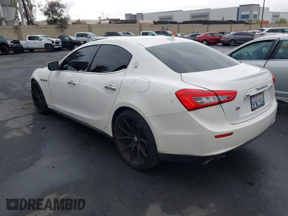 2014 Maserati Ghibli S Q4 with VIN ZAM57RTA3E1090350, listed as a IAAI auction lot 42056682 with 119,160 mi miles and . Bid and sale history available at DreamBid. Image 3.