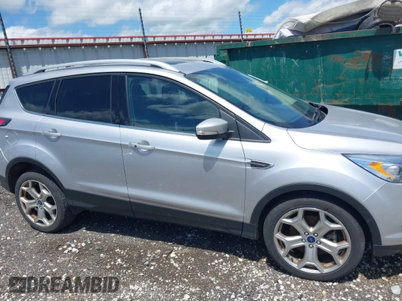 2017 Ford Escape Titanium with VIN 1FMCU0J99HUB23567, listed as a IAAI auction lot 42127795 with 93,056 mi miles. Bid and sale history available at carsss.com. Image 6.