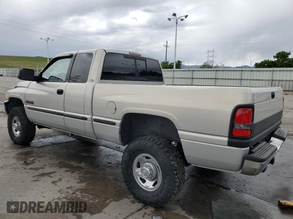 1999 Dodge 2500 z VIN 1B7KF2361XJ509781, wystawiony jako Copart lot #57282495 z przebiegiem 135 666 mil mil oraz Szkoda całkowita • Salvage title. Historia ofert i sprzedaży dostępna na DreamBid. Obrazek 2.