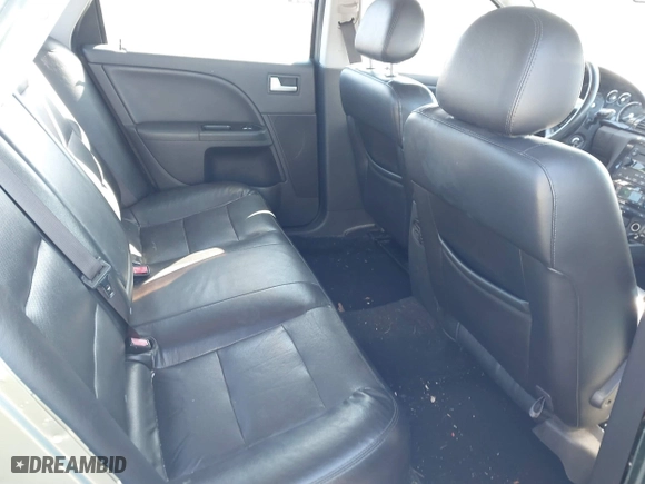 2005 Mercury Montego Premier with VIN 1MEFM42165G618285, listed as a IAAI auction lot 41595913 with 127,811 mi miles. Bid and sale history available at carsss.com. Image 8.