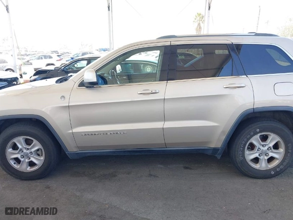 2014 Jeep Grand Cherokee Laredo with VIN 1C4RJFAG7EC380544, listed as a IAAI auction lot 42021130 with 166,589 mi miles. Bid and sale history available at carsss.com. Image 14.
