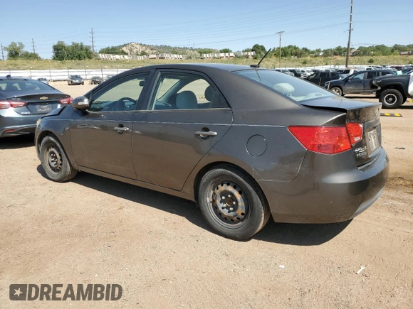2010 Kia Forte EX with VIN KNAFU4A22A5880772, listed as a Copart auction lot 71679444 with 150,734 mi miles and Salvage Title. Bid and sale history available at carsss.com. Image 2.