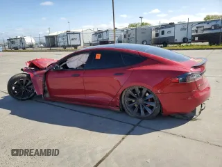 2016 Tesla Model S 90D with VIN 5YJSA1E44GF162393, listed as a Copart auction lot 51708825 with 173,880 mi miles and Salvage title. Bid and sale history available at DreamBid. Image 2.
