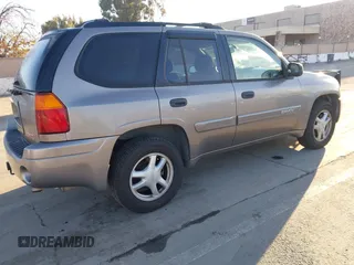 2005 GMC Envoy SLT with VIN 1GKDT13S152373799, listed as a IAAI auction lot 41537512 with 187,750 mi miles. Bid and sale history available at carsss.com. Image 4.