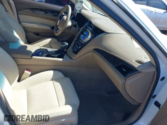 2016 Cadillac CTS Luxury Collection AWD with VIN 1G6AX5SS5G0153563, listed as a IAAI auction lot 41894418 with 82,722 mi miles and . Bid and sale history available at DreamBid. Image 5.