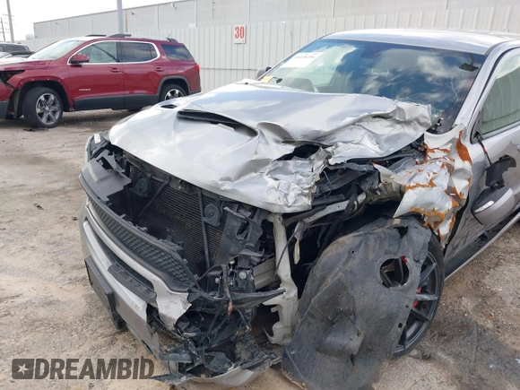 2018 Dodge Durango SRT with VIN 1C4SDJGJ5JC256006, listed as a IAAI auction lot 41038356 with 71,385 mi miles and . Bid and sale history available at DreamBid. Image 6.