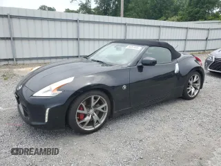 2014 Nissan 370Z Touring with VIN JN1AZ4FH8EM621309, listed as a Copart auction lot 56067635 with 38,186 mi miles and Salvage title. Bid and sale history available at DreamBid. Image 1.