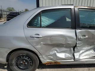 2009 Toyota Yaris with VIN JTDBT903391300394, listed as a Copart auction lot 53392945 with 227,210 mi miles and Salvage Title. Bid and sale history available at DreamBid. Image 10.