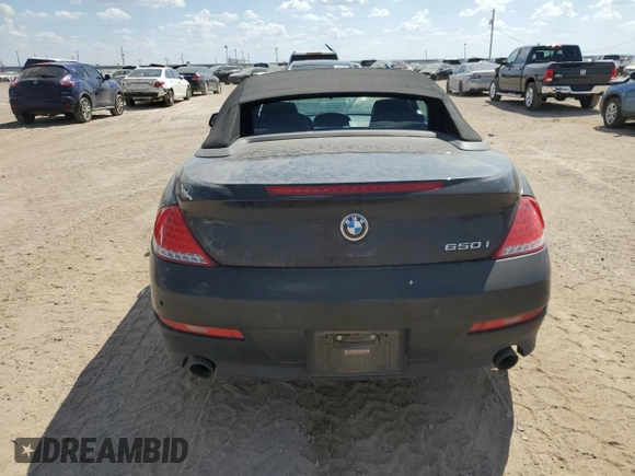 2010 BMW 6 Series 650i z VIN WBAEB5C52AC225960, wystawiony jako Copart lot #71639634 z przebiegiem 114 696 mil mil oraz Czysty tytuł • Clean title. Historia ofert i sprzedaży dostępna na DreamBid. Obrazek 6.