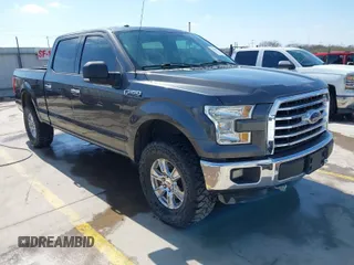 2015 Ford F-150 XLT w/HD Payload Pkg with VIN 1FTFW1EF7FKD04869, listed as a IAAI auction lot 41664736 with 165,784 mi miles. Bid and sale history available at carsss.com. Image 1.