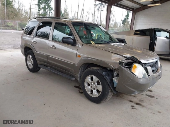 2002 Mazda Tribute LX with VIN 4F2YU08192KM29763, listed as a IAAI auction lot 41931794 with 193,771 mi miles. Bid and sale history available at carsss.com. Image 1.
