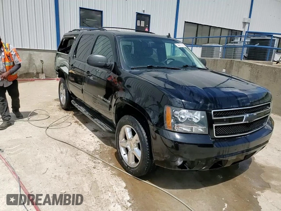 2014 Chevrolet Suburban LT with VIN 1GNSKJE77ER193143, listed as a Copart auction lot 54311935 with 171,407 mi miles and Salvage Title. Bid and sale history available at DreamBid. Image 15.