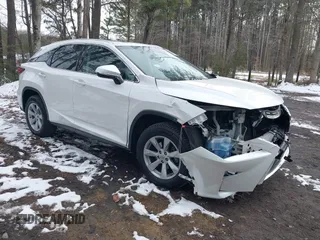 2017 Lexus RX with VIN 2T2BZMCA7HC057951, listed as a IAAI auction lot 41374368 with 113,366 mi miles. Bid and sale history available at carsss.com. Image 1.