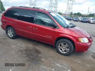 2001 Dodge Caravan Sport with VIN 2B8GP44G21R182764, listed as a IAAI auction lot 42660943 with 117,826 mi miles and . Bid and sale history available at DreamBid. Image 1.