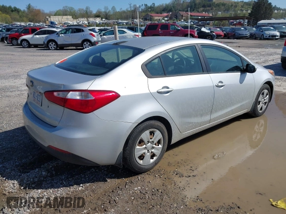 2015 Kia Forte LX with VIN KNAFK4A67F5340351, listed as a IAAI auction lot 41982078 with 217,530 mi miles. Bid and sale history available at carsss.com. Image 4.