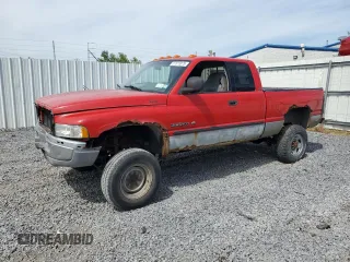 2000 Dodge 2500 z VIN 1B7KF23Z6YJ187490, wystawiony jako Copart lot #57873375 z przebiegiem 238 769 mil mil oraz Szkody całkowita. Historia ofert i sprzedaży dostępna na DreamBid. Obrazek 1.
