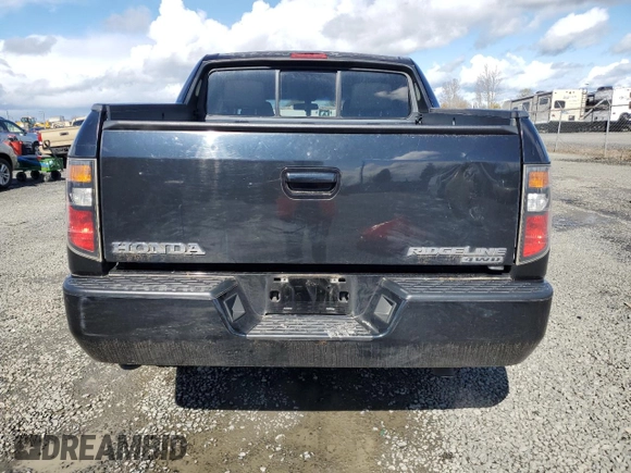 2006 Honda Ridgeline RTL with VIN 2HJYK16546H526492, listed as a Copart auction lot 49351695 with 193,622 mi miles and Salvage Title. Bid and sale history available at DreamBid. Image 6.