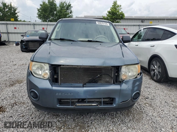 2010 Ford Escape XLS with VIN 1FMCU0C78AKD44185, listed as a Copart auction lot 60876155 with 157,399 mi miles and Salvage title. Bid and sale history available at DreamBid. Image 5.