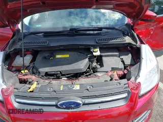 2016 Ford Escape SE z VIN 1FMCU9GX0GUB51525, wystawiony jako IAAI lot #42237629 z przebiegiem 76 616 mil mil oraz . Historia ofert i sprzedaży dostępna na DreamBid. Obrazek 10.