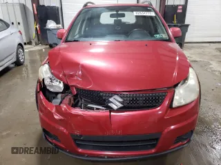 2012 Suzuki SX4 Crossover with VIN JS2YB5A38C6301805, listed as a Copart auction lot 82834774 with 141,858 mi miles and Salvage Title. Bid and sale history available at carsss.com. Image 5.