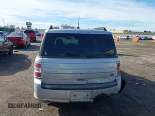 2016 Ford Flex SE z VIN 2FMGK5B8XGBA23900, wystawiony jako IAAI lot #41599714 z przebiegiem 102 961 mil mil oraz . Historia ofert i sprzedaży dostępna na DreamBid. Obrazek 16.