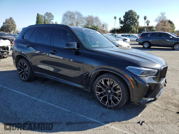 2021 BMW X5 M with VIN 5YMJU0C07M9E05854, listed as a Copart auction lot 38657883 with 14,083 mi miles. Bid and sale history available at carsss.com. Image 4.