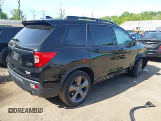 2021 Honda Passport Touring z VIN 5FNYF8H96MB014947, wystawiony jako IAAI lot #42150399 z przebiegiem 47 499 mil mil oraz . Historia ofert i sprzedaży dostępna na DreamBid. Obrazek 4.