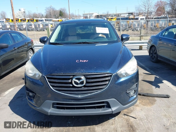 2016 Mazda CX-5 Touring with VIN JM3KE4CY0G0631786, listed as a IAAI auction lot 41761214 with 220,058 mi miles. Bid and sale history available at carsss.com. Image 12.