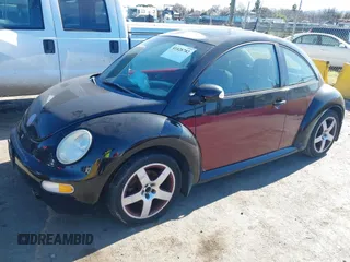 2005 Volkswagen New Beetle Coupe GLS with VIN 3VWCK31C45M404762, listed as a IAAI auction lot 41428782 with 135,706 mi miles. Bid and sale history available at carsss.com. Image 2.
