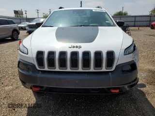 2014 Jeep Cherokee Trailhawk with VIN 1C4PJMBS9EW140344, listed as a Copart auction lot 50579005 with 117,326 mi miles and Salvage Title. Bid and sale history available at carsss.com. Image 5.