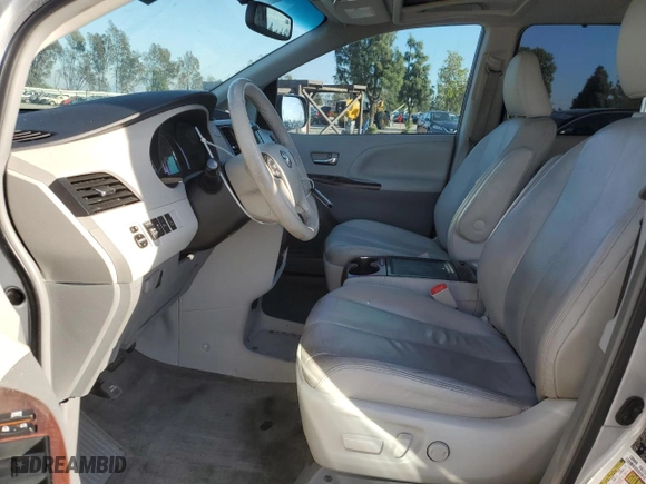 2014 Toyota Sienna XLE with VIN 5TDYK3DC8ES472826, listed as a Copart auction lot 46174385 with 129,094 mi miles and Salvage Title. Bid and sale history available at carsss.com. Image 7.