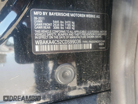 2012 BMW 7 Series 740i with VIN WBAKA4C52CDS99036, listed as a Copart auction lot 88492615 with Not provided miles and Salvage title. Bid and sale history available at DreamBid. Image 12.