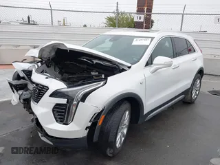 2022 Cadillac XT4 FWD Premium Luxury with VIN 1GYFZCR49NF100393, listed as a IAAI auction lot 42497187 with 23,672 mi miles and . Bid and sale history available at DreamBid. Image 2.